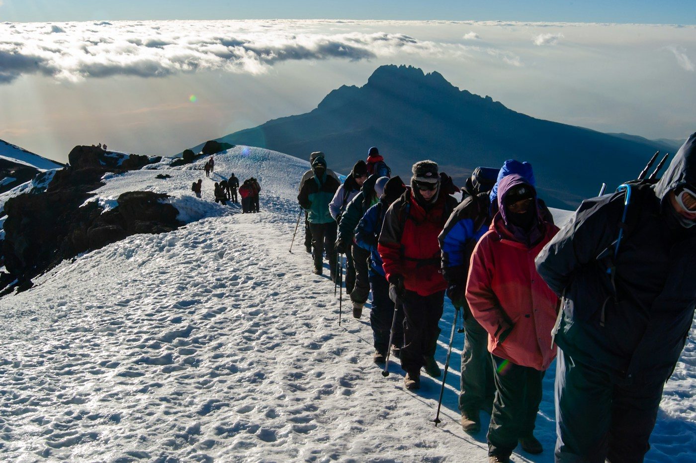 Climbers ascending Kilimanjaro by headlamp on summit night